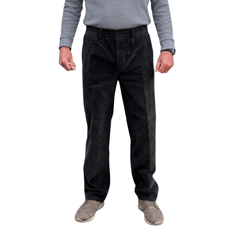Pantalones de pana negros con cintura elástica y costuras clásicas vistos de frente en una persona