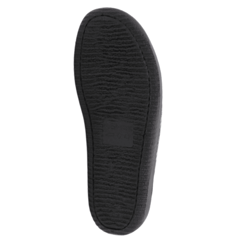 Suela exterior de goma negra flexible de una zapatilla de casa Rohde con textura antideslizante