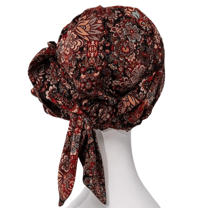 Turbante Juvela Floral Folklore en maniquí, vista trasera con lazos sueltos y patrón