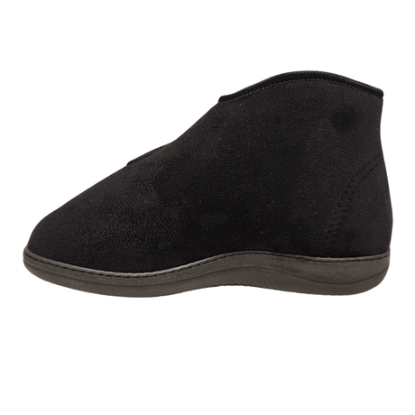 Zapato de terapia alto negro, vista lateral, con exterior liso y tobillo alto