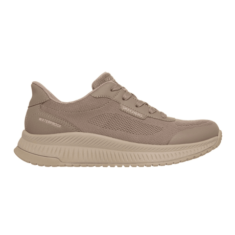 Zapato Skechers slip-in outdoor de mujer color arena, vista lateral, con logo "Skechers" y texto "Waterproof"