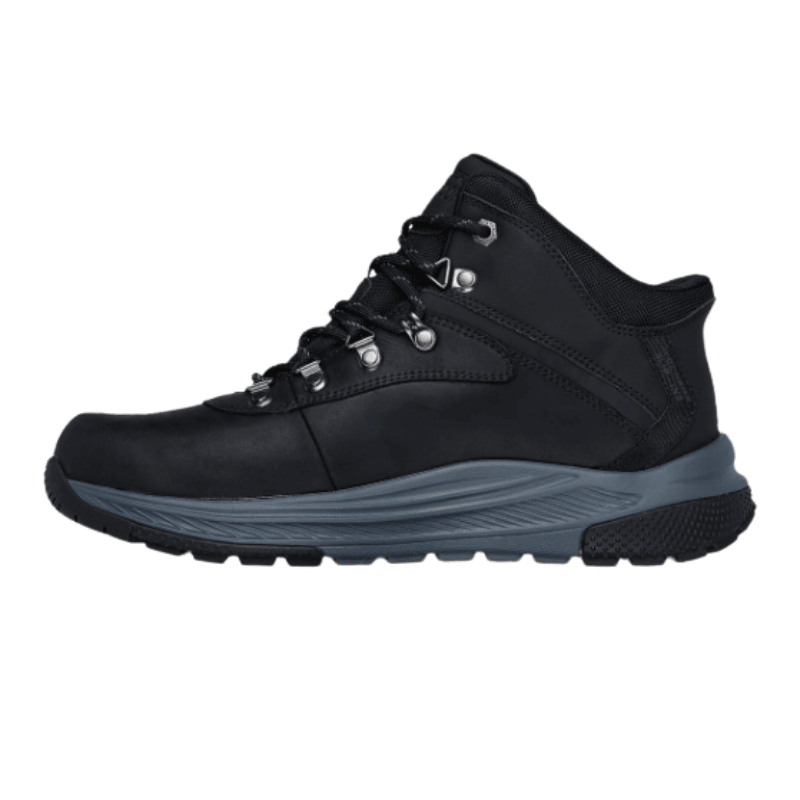 Bota Skechers negra para hombre, vista lateral derecha, con suela gris robusta y cordones