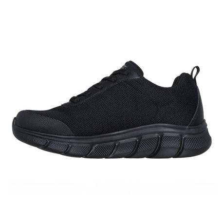 Clásica zapatilla Skechers negra para hombre con cordones y suela robusta, vista de lado