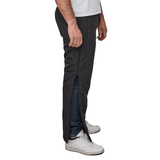 Vista lateral de pantalones térmicos Dobsom negros con la cremallera completa parcialmente abierta